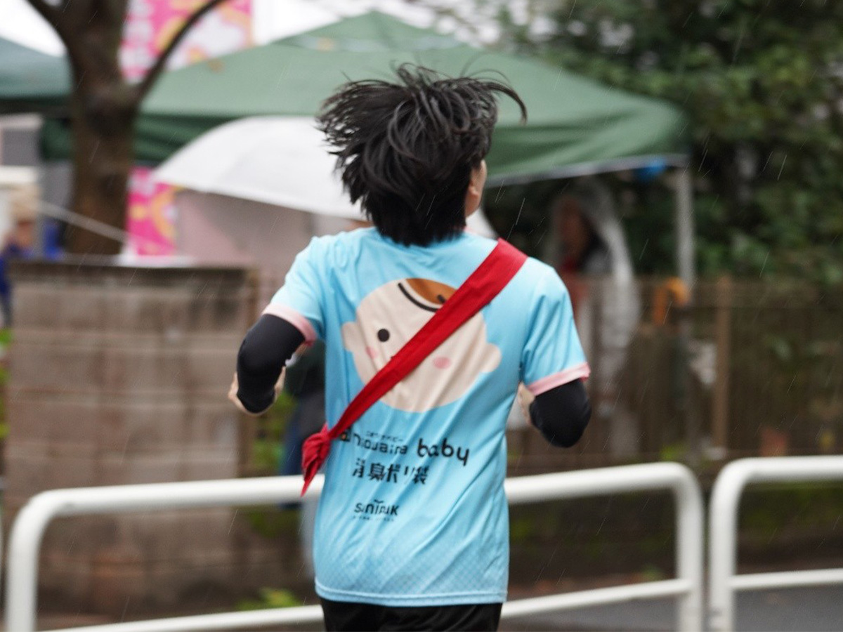 折り返し地点から折り返すサニパックの社員（チーム niowaina baby）